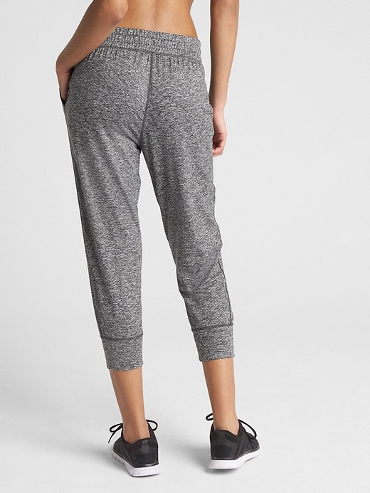 2 of 8 showing, with the color medium grey heather of product GapFit Cropped Joggers in Brushed Jersey