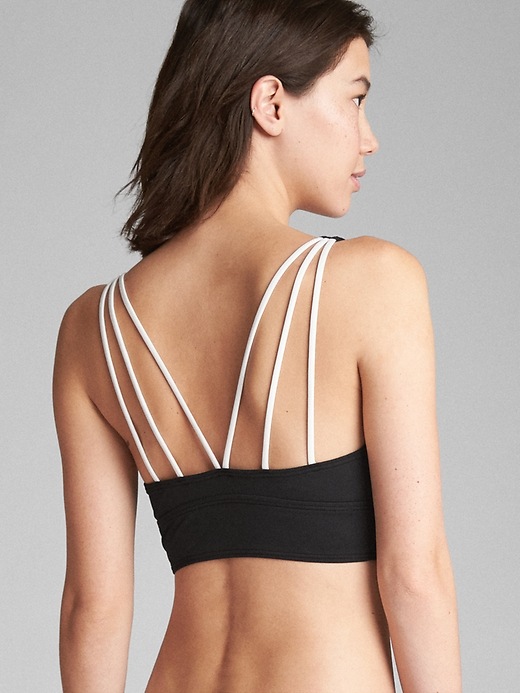 1 of 8 showing, with the color black/white of product GapFit Triangle Bralette Bikini Top