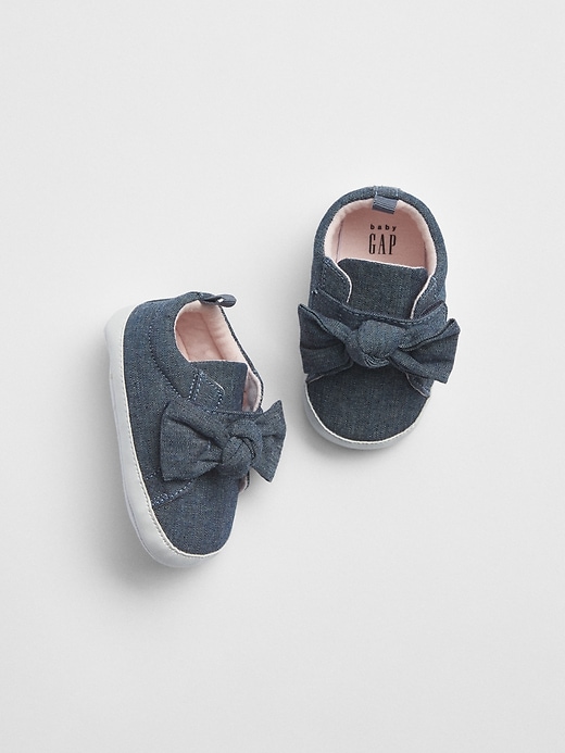 View large product image 1 of 1. Chambray Bow Sneakers