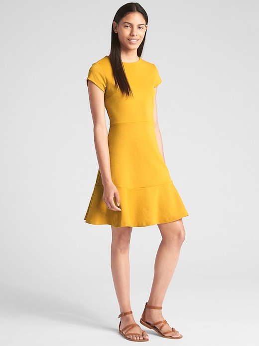 View large product image 1 of 1. Fit and Flare Peplum Dress in Ponte