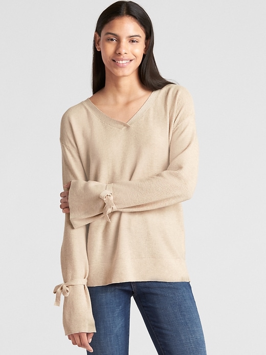 View large product image 1 of 1. Tie-Sleeve Ribbed V-Neck Pullover Sweater