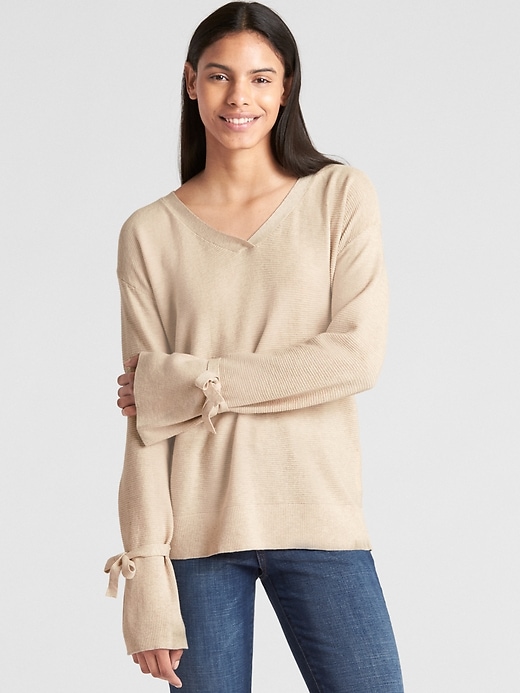 1 of 8 showing, with the color oatmeal heather of product Tie-Sleeve Ribbed V-Neck Pullover Sweater