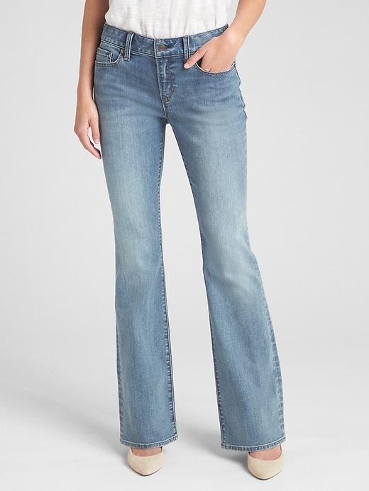 1 of 8 showing, with the color (Medium) Medium Indigo of product Mid Rise Long and Lean Jeans