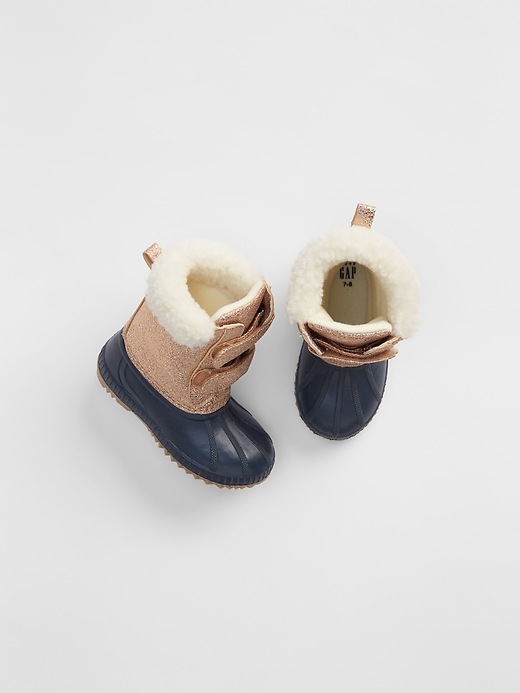 View large product image 1 of 1. Metallic Sherpa Duck Boots