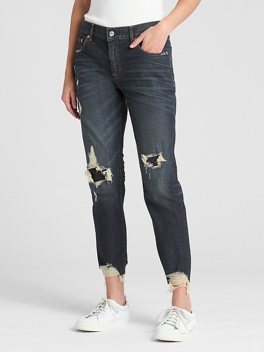 1 of 8 showing, with the color (Dark) Dark Indigo Distressed of product Mid Rise Girlfriend Jeans in Distressed