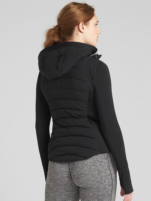 View large product image 2 of 8. GapFit Lightweight Hooded Puffer Vest