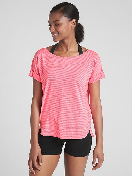 1 of 8 showing, with the color light pink of product GapFit Breathe Roll Sleeve T-Shirt