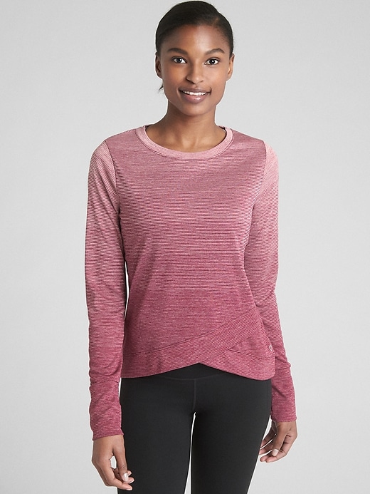 1 of 8 showing, with the color berry stripe of product GapFit Long Sleeve Tulip-Front Top