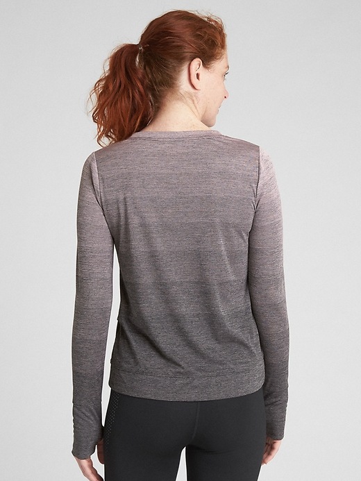 View large product image 2 of 7. GapFit Long Sleeve Tulip-Front Top