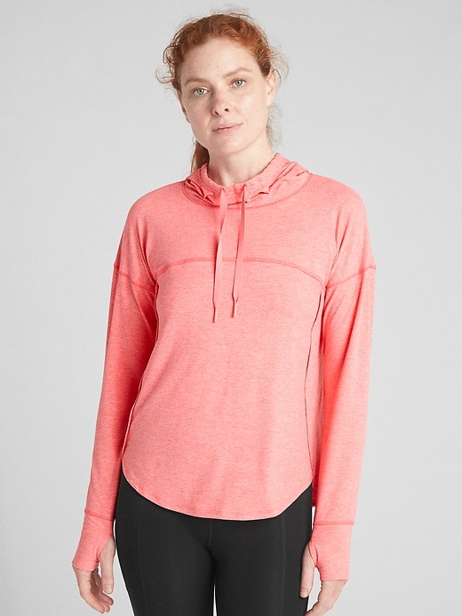 View large product image 1 of 1. GapFit Pullover Hoodie in Brushed Tech Jersey
