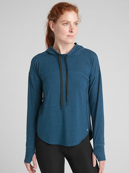 View large product image 1 of 1. GapFit Pullover Hoodie in Brushed Tech Jersey