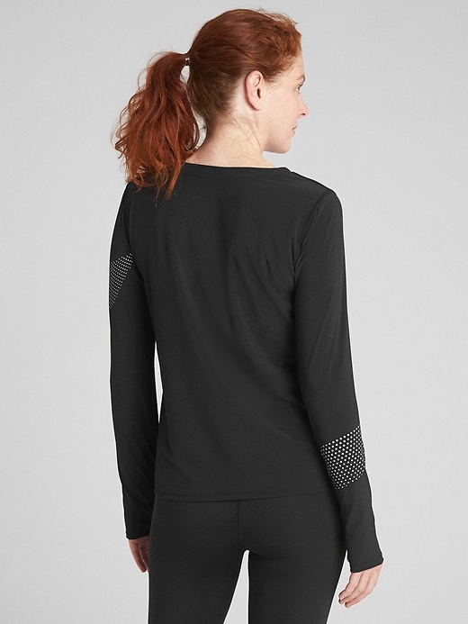 View large product image 2 of 7. GapFit Long Sleeve Reflective Print Top