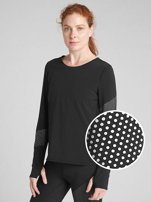 View large product image 1 of 7. GapFit Long Sleeve Reflective Print Top
