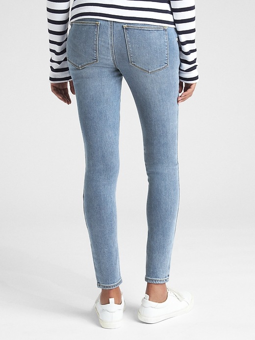 2 of 8 showing, with the color medium wash of product Maternity Soft Wear Inset Panel True Skinny Jeans