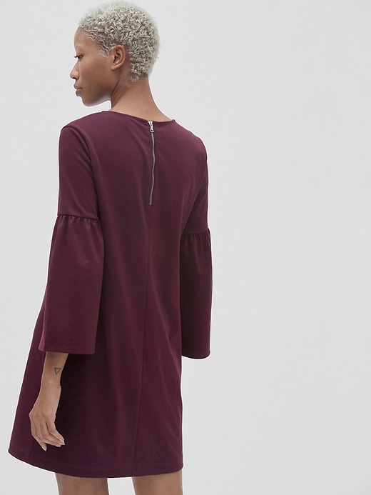 2 of 8 showing, with the color vamp red of product Bell Sleeve Shift Dress in Ponte