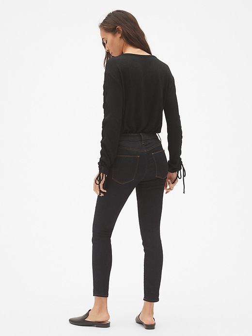 2 of 8 showing, with the color true black of product Softspun Lace-Up Long Sleeve Top
