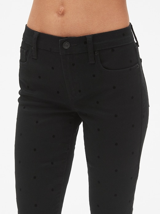 Image number 5 showing, Mid Rise True Skinny Jeans with Polka Dots
