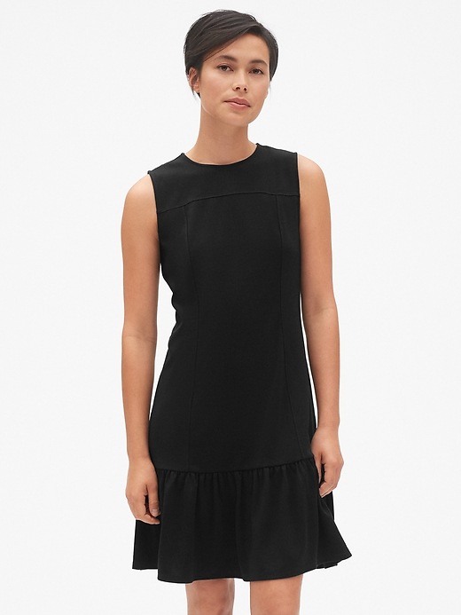 View large product image 1 of 1. Sleeveless Flounce Dress in Ponte