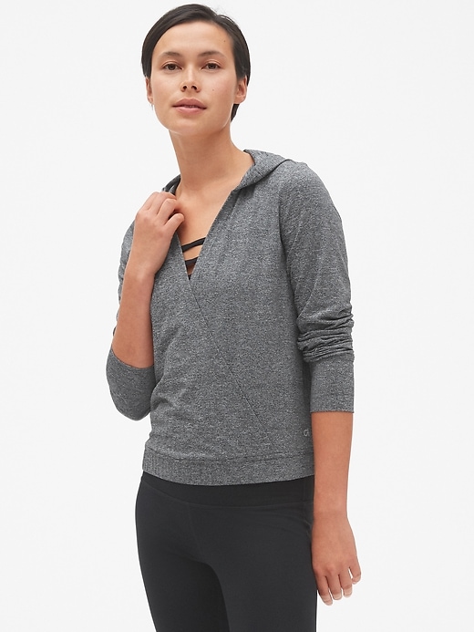 View large product image 1 of 1. GapFit Wrap-Front Pullover Hoodie in Brushed Tech Jersey