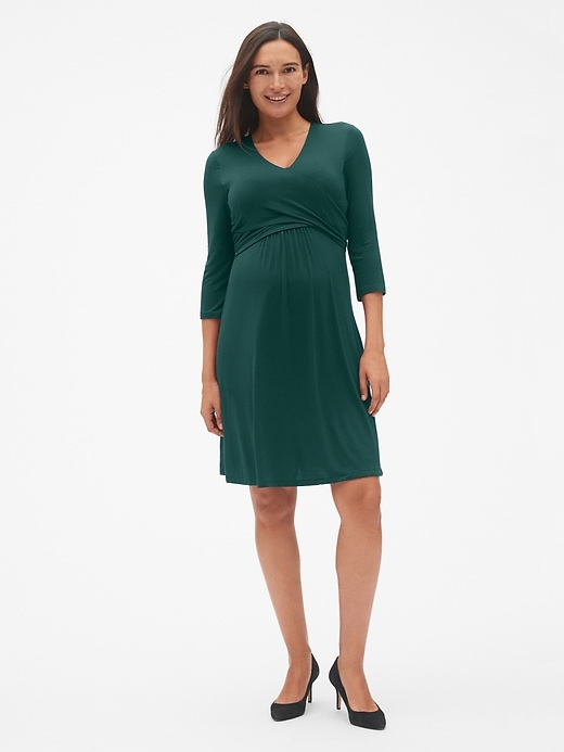 1 of 8 showing, with the color tropic green of product Maternity Three-Quarter Sleeve Wrap Dress