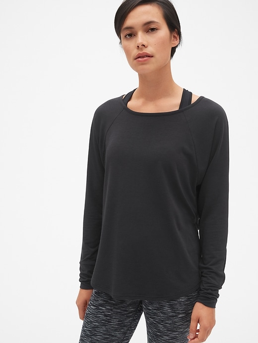 View large product image 2 of 7. GapFit Double-Layer Long Sleeve Cut-Out Top