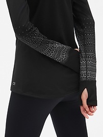View large product image 4 of 9. GapFit Winterbrush Asymmetrical Half-Zip Reflective Print Pullover