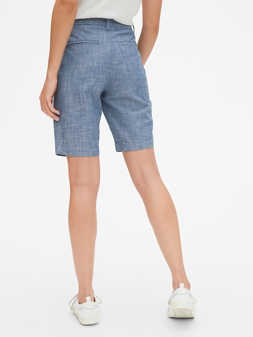 2 of 8 showing, with the color medium indigo of product 10" Bermuda Shorts in Stretch Chambray