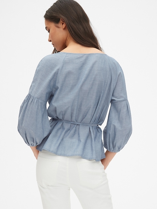 2 of 8 showing, with the color medium indigo of product Balloon Sleeve Button-Down Blouse in Chambray