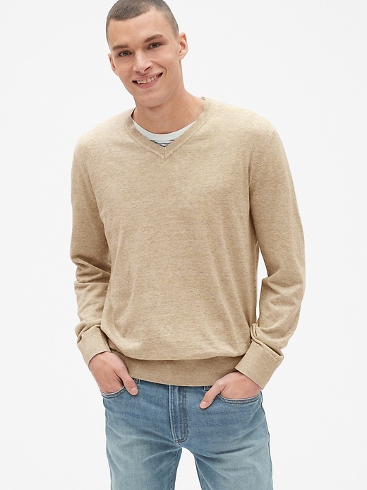 1 of 8 showing, with the color transition cream of product The Mainstay V-Neck Sweater