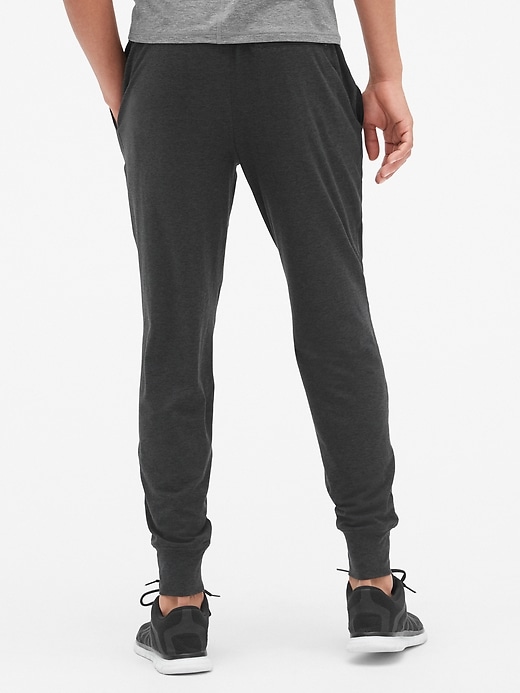 2 of 8 showing, with the color true black of product Gapfit Brushed Tech Jersey Jogger