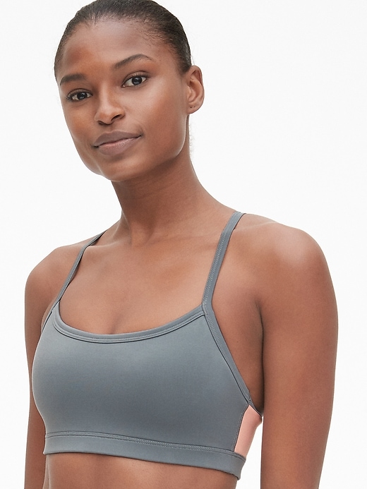 1 of 8 showing, with the color mercury grey of product GapFit Low Support Racerback Sports Bra