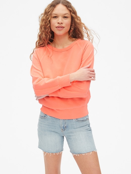 1 of 8 showing, with the color neon coral of product Vintage Soft Raglan Pullover Sweatshirt
