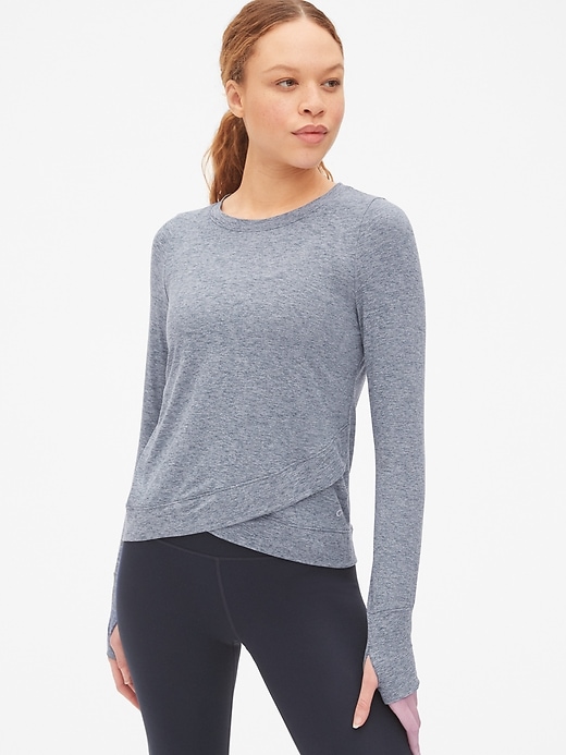 View large product image 1 of 1. GapFit Long Sleeve Tulip-Front Top in Brushed Tech Jersey