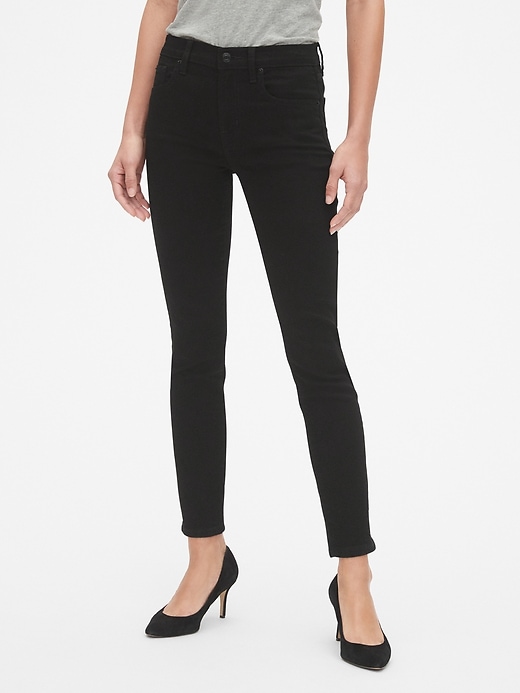 1 of 8 showing, with the color (Black) Black Rinse of product Mid Rise True Skinny Jeans