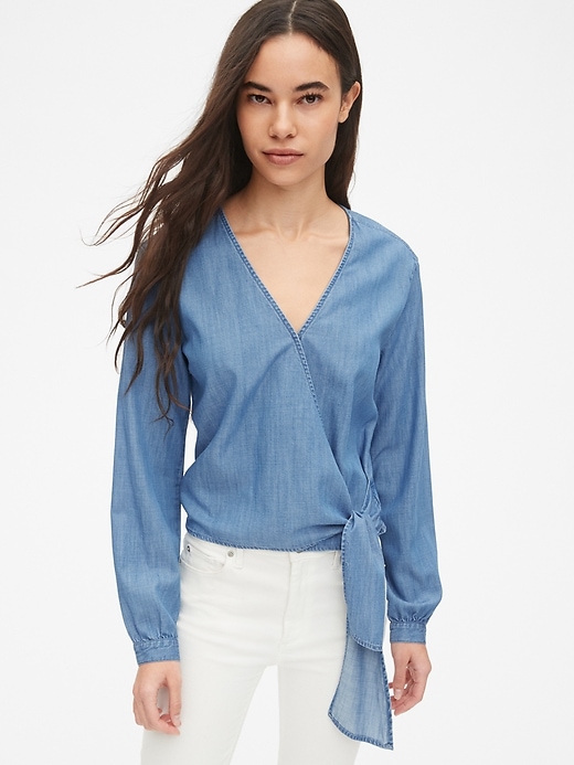 1 of 8 showing, with the color medium indigo of product Long Sleeve Wrap Top in TENCEL™