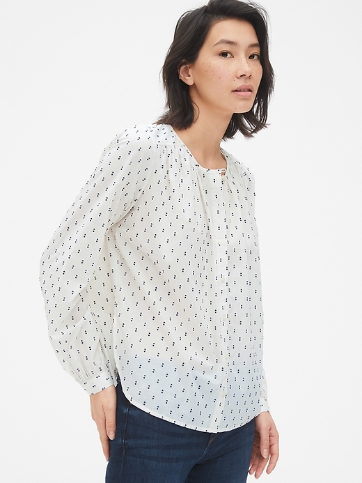 1 of 8 showing, with the color navy dot of product Long Sleeve Shirred Blouse in Clip-Dot