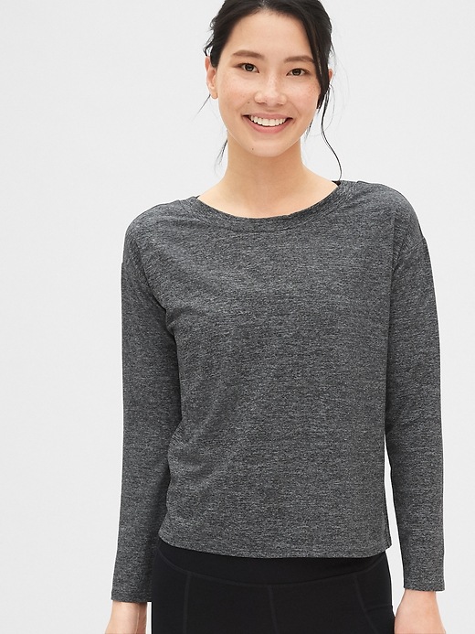 1 of 8 showing, with the color medium gray of product GapFit Tie-Back Sweatshirt in Brushed Tech Jersey