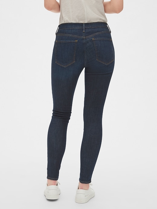 2 of 8 showing, with the color (Dark) Dark Indigo of product Mid Rise True Skinny Jeans in Sculpt With Washwell™