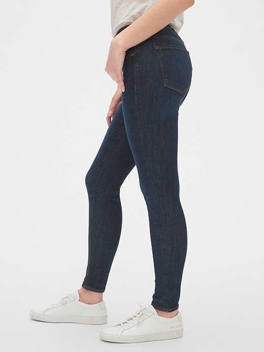 1 of 8 showing, with the color (Dark) Dark Indigo of product Mid Rise True Skinny Jeans in Sculpt With Washwell™