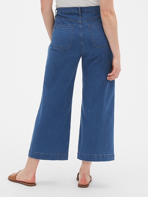 2 of 8 showing, with the color (Medium) Indigo of product High Rise Utility Wide-Leg Crop Jeans