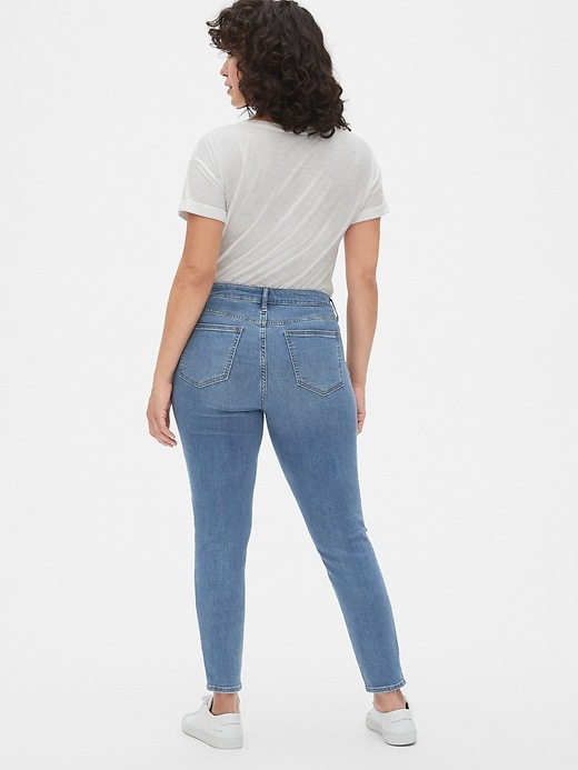 Image number 8 showing, Mid Rise Curvy True Skinny Jeans with Distressed Detail
