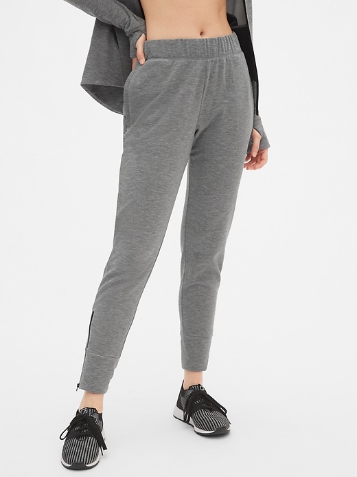 View large product image 1 of 1. GapFit All Elements Fleece Slim Straight Joggers