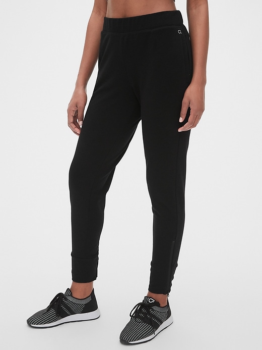 Image number 1 showing, GapFit All Elements Fleece Slim Straight Joggers
