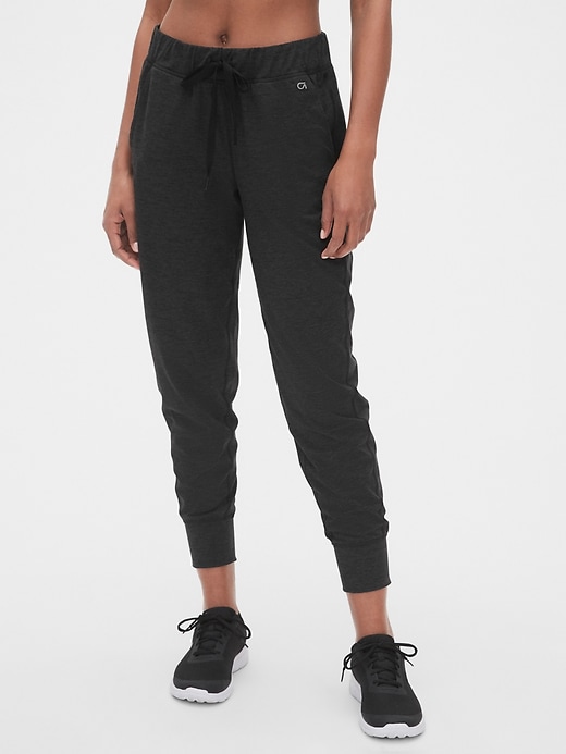 View large product image 1 of 1. GapFit Brushed Tech Jersey Joggers