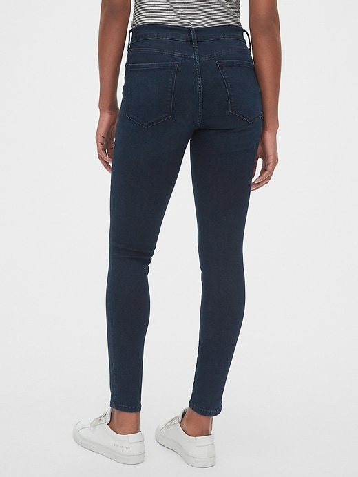 2 of 8 showing, with the color rinse of product Mid Rise True Skinny Jeans in Sculpt