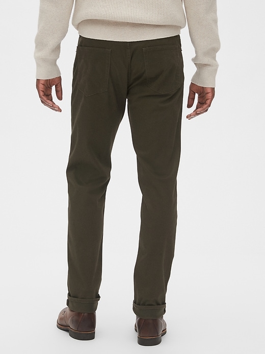 2 of 8 showing, with the color wet moss of product Soft Wear Slim Jeans with GapFlex
