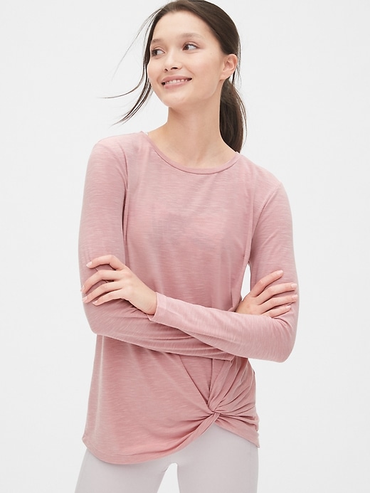 1 of 8 showing, with the color cavan pink rose of product GapFit Breathe Long Sleeve Twist-Front Top