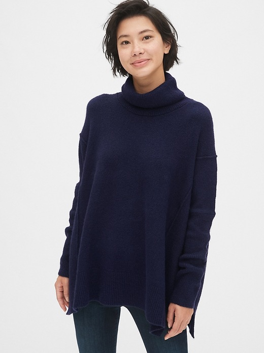 View large product image 1 of 1. Turtleneck Poncho Sweater