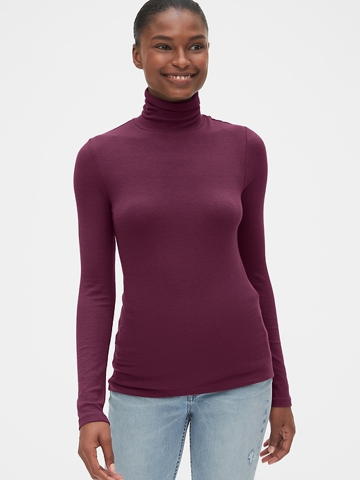 View large product image 1 of 1. Ribbed Turtleneck Top in Modal