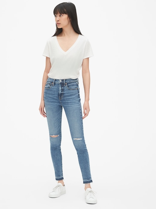 Image number 3 showing, High Rise True Skinny Ankle Jeans with Distressed Detail